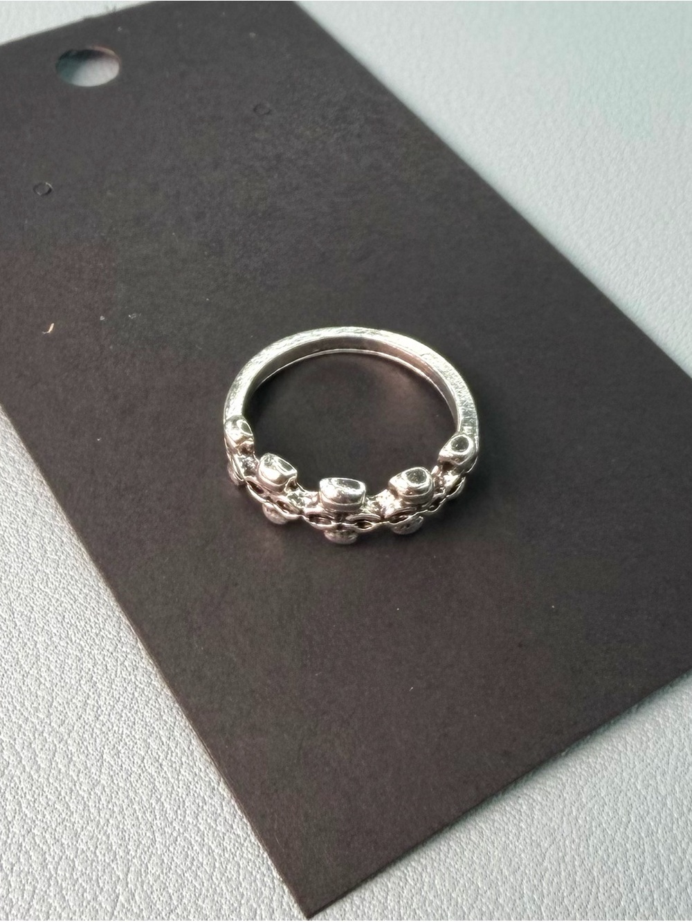 Silver Tone metal connected skull designs- Silver Band